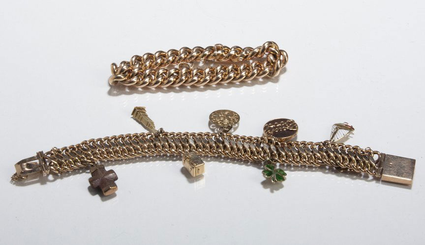 Two Rose Gold Chain Bracelets.: Two Rose Gold Chain Bracelets: A - 14k marked chain with figural charms (unmarked, 10k & 14K), approximately 2.48 ounces, 7" long. B - 585 marked hollow chain with charm clasp, 7 1/2" long, .8 troy ou