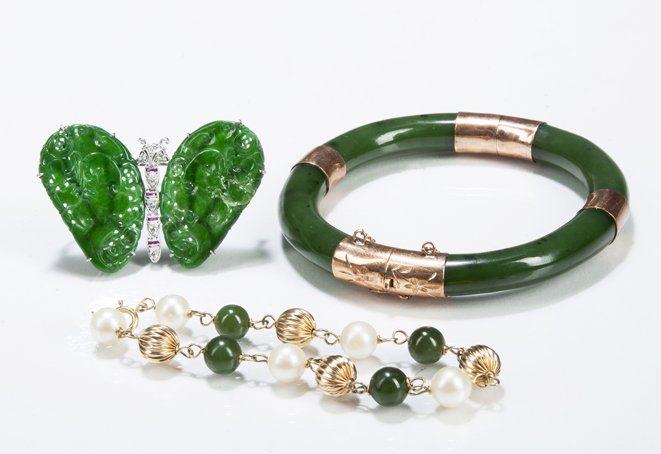Jade Jewelry: Jade Jewelry, a 14k white gold filigree butterfly with diamond and rubies inset in body, imperial jade wings, one repaired, a jade bangle with rose gold mounts, marked 14k and a jade pearl and gold br