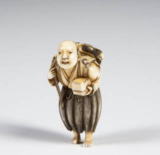 Ivory Netsuke of Urashima Taro: Beautifully Carved Ivory Katabori Netsuke of Urashima Taro, depicted as an old man with a turtle on his back and a box in one hand, signed on the back. Provenance: The estate collection of Dr. and Mrs