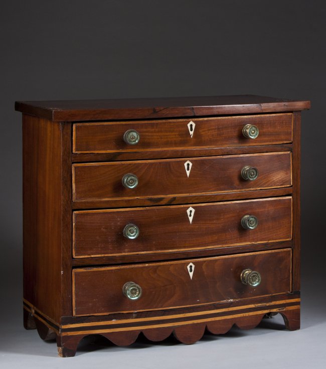 English Hepplewhite Mahogany Miniature Chest: English Hepplewhite Mahogany Miniature Chest, 4-drawer tall, ivory escutcheons, period Sheraton pulls (one off), line inlay around drawers and base, scalloped skirt, 14 3/4" tall x 17" wide x 9 1/4" d
