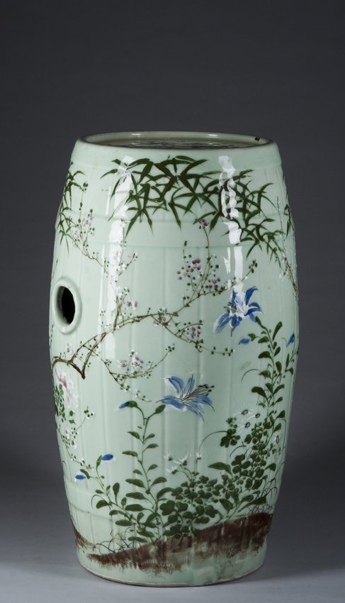 Chinese Celadon Garden Seat: Chinese Celadon Garden Seat, barrel form, decorated with bamboo cherry blossoms, 23" tall, 19/20th Century.