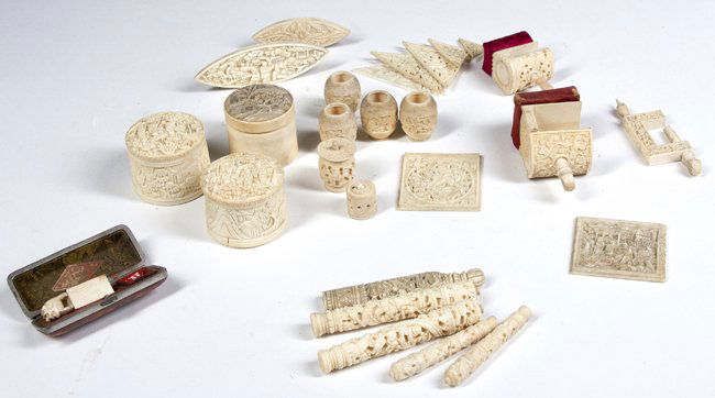 Chinese Carved Ivory Sewing and Toilet Items: Chinese Carved Ivory Sewing and Toilet Items, 27 pieces, covered jars, spool and needle holder, pin cushions and a chop in case, 19/20th Century.