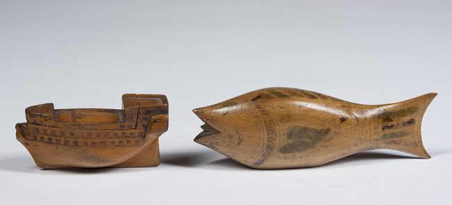 Nautical Themed Snuff or Trinket Boxes: Nautical Themed Snuff or Trinket Boxes, a 6 1/2" long fish with ink decoration and hollow lidded body and a 4" long carved ship with hinged deck, probably 19th Century and sailor made.