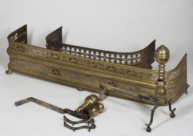 Pierced Brass Fire Fenders and Andirons: Pierced Brass Fire Fenders and Andirons, a 26" wide paw foot fender, a 43 1/2" wide fender missing 2 paw feet, and an 18' tall ball top andirons, one having a broken base, all 19th Century.