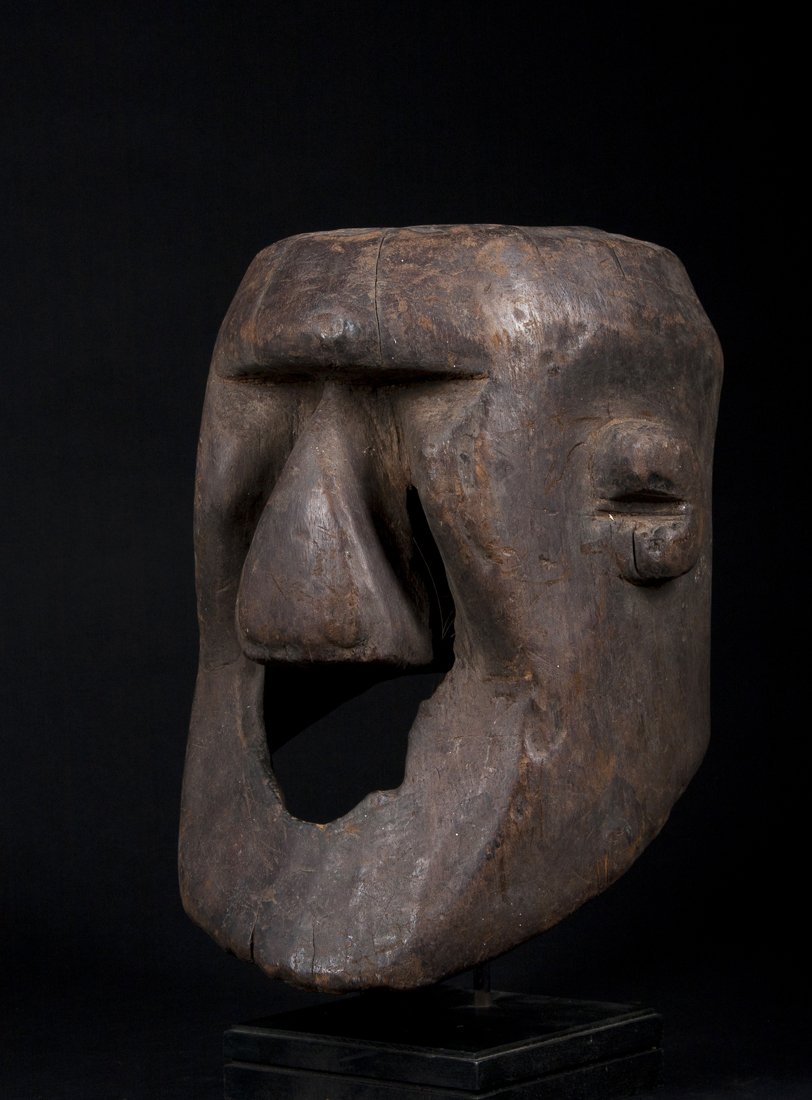 A fine and rare Northern Kuba helmet mask: Kuba, D.R. Congo; H: 13 1/2"Of massive powerful form, probably Ngongo or Batwa subgroups, of the Bongo type helmet masks, with extremely old damage where the mouth and areas of the nose have broken aw