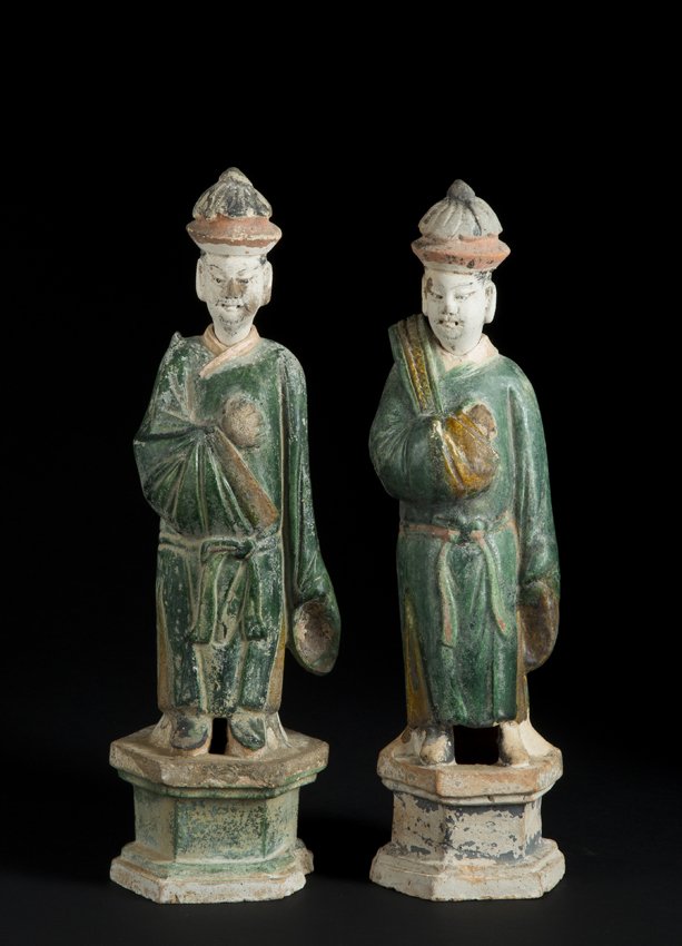 Pair Chinese "Tang" Pottery Tomb Nodders: Pair Chinese "Tang" Pottery Tomb Guardians/Nodder Figures, a standing robbed figure with a peeked hat with his right arm to his chest, supported by a hexagonal base, much of the green and yellow glaze