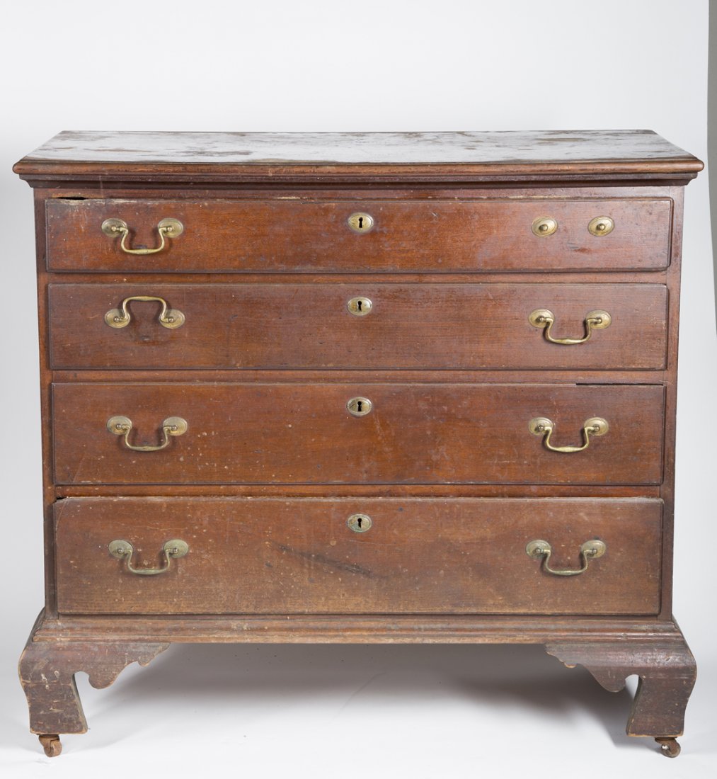 Chippendale Ogee Footed Chest of Four Drawers: Chippendale Ogee Footed Chest of Four Drawers, a molded edge top above a conforming Cherry case with four lipped drawers with some repair, replaced post and bail brasses, replaced base, old varnish fi