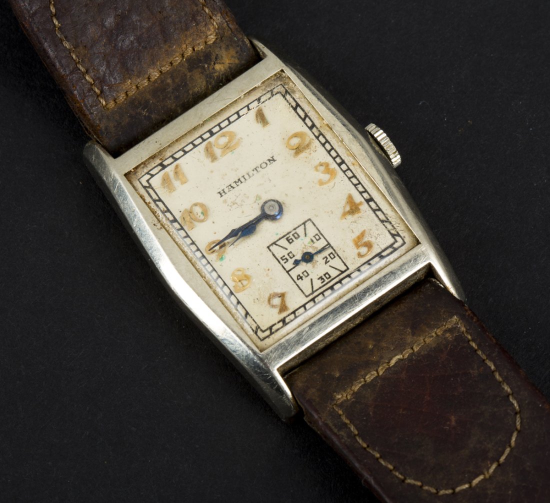 14K White Gold "Hamilton" Wrist Watch, model A888: 14K White Gold "Hamilton" Wrist Watch, model A888, man's tank form , 19 jewels, leather wristband, not working, mid 20thC. Estimate: $300 - $500