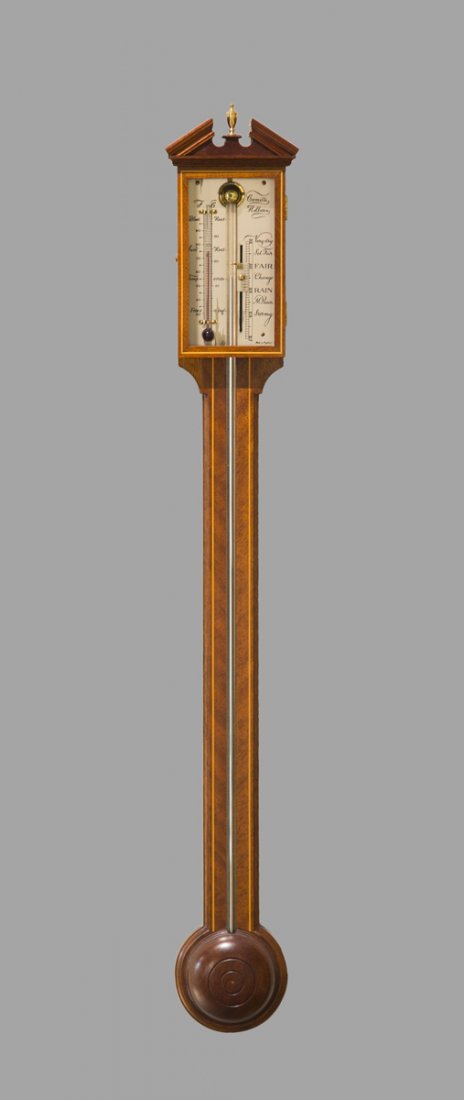 Modern English Barometer: Modern English Barometer, mercury driven barometer with a side thermometer, signed on dial, "Comilli Holburn", line inlaid case with exposed mercury tube, in working condition, 38 1/2" T. Estimate: $2