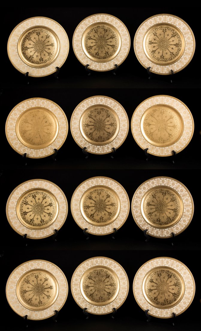 Set of 12 Bavarian Gold Plates: Set of 12 Bavarian Gold Plates, Each 11" D, all over gold decoration on a cream porcelain, marked on back "Crown R + C Selb Bavaria, Heinrich and Co", make for "Baily Banks and Biddle", Philadelphia. 