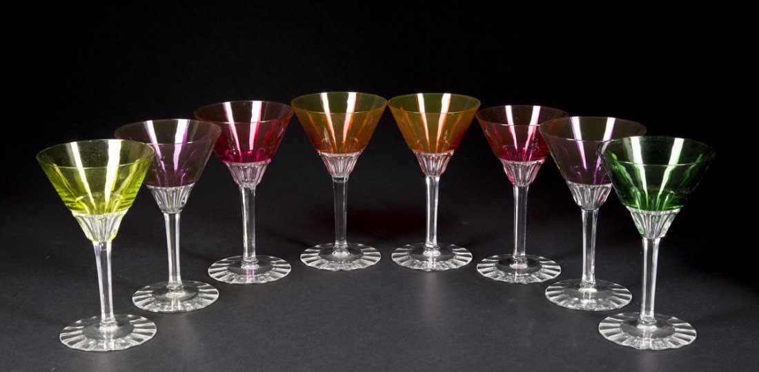 Eight Baccarat Martini Glasses: Eight Baccarat Martini Glasses, assembled set, marked on the bottom, 4 red, 2 purple, 1 green and 1 yellow, 6" T, E.20thC., all marked on bottom, France. Estimate: $300 - $500