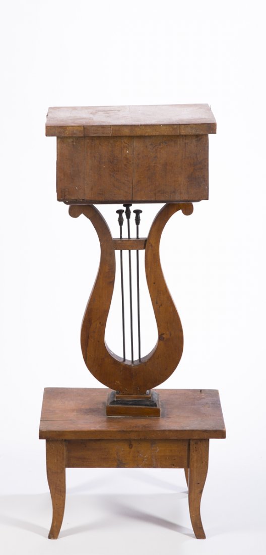 Beidermeir One Drawer Table: Beidermeir One Drawer Table, a rectangular wavy birch vaneer top over a drawer case supported by a lyre form pedestal set on a rectangular base with four short French style legs, 14 1/2" x 9 3/4" x 33