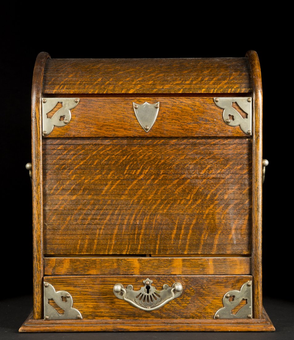 English Oak Toll Top Desk Box: English Oak Roll Top Desk Box, when the bottom drawer pulls out the two roll sections slide up to reveal central drawers and top storage cubby's, E20thC., 16" T x 14" W x 10" d, nickel plated hardware