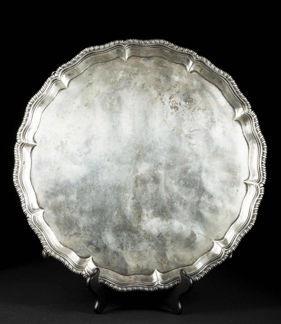 William Preston English Chippendale Silver Tray: William Preston English Chippendale Silver Tray, scalloped sided 15 1/2"D tray with gadrooned edge and set on 4 scrolled feet, London hallmarks and letter date of 1754. A few dimples and wear scratche