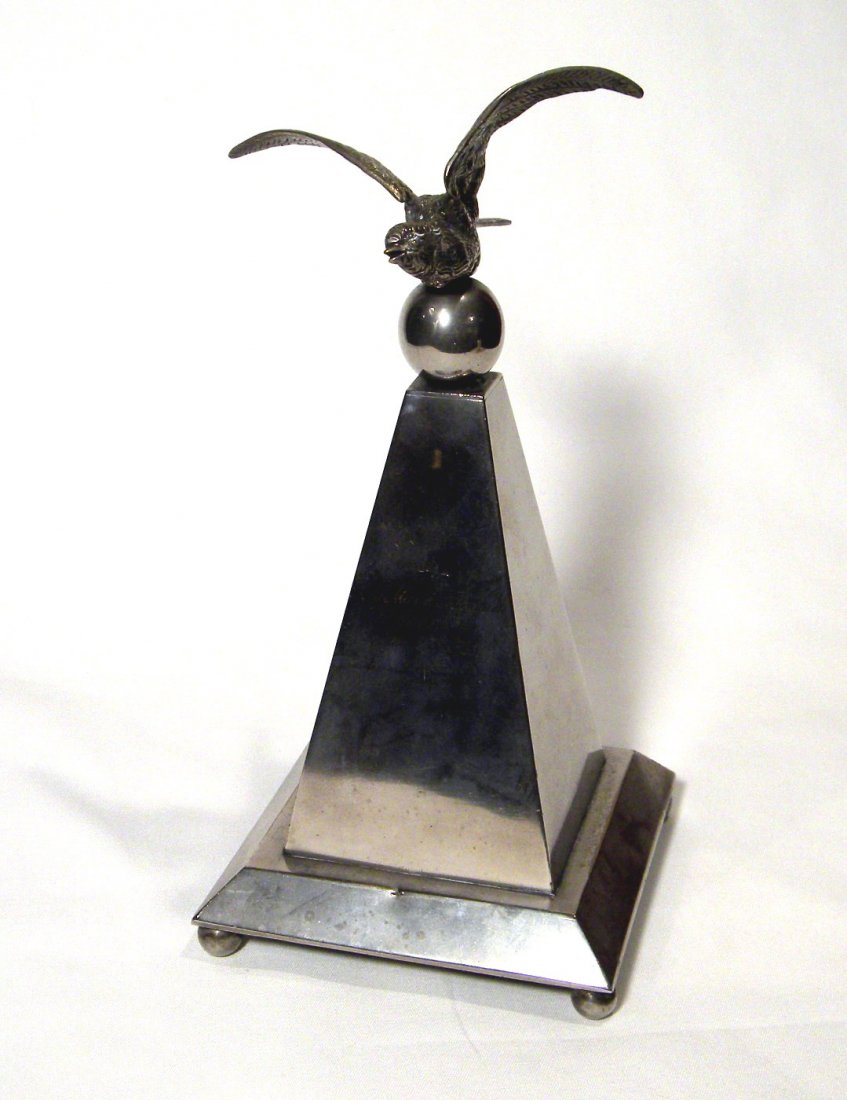 Eagle Finial Still Bank: One-of-a-kind silver-plate bank with Eagle finial, marked "Rita Marsh Thompson, Born Dec. 27th 1925", slight dent in base, approx. 11" tall.