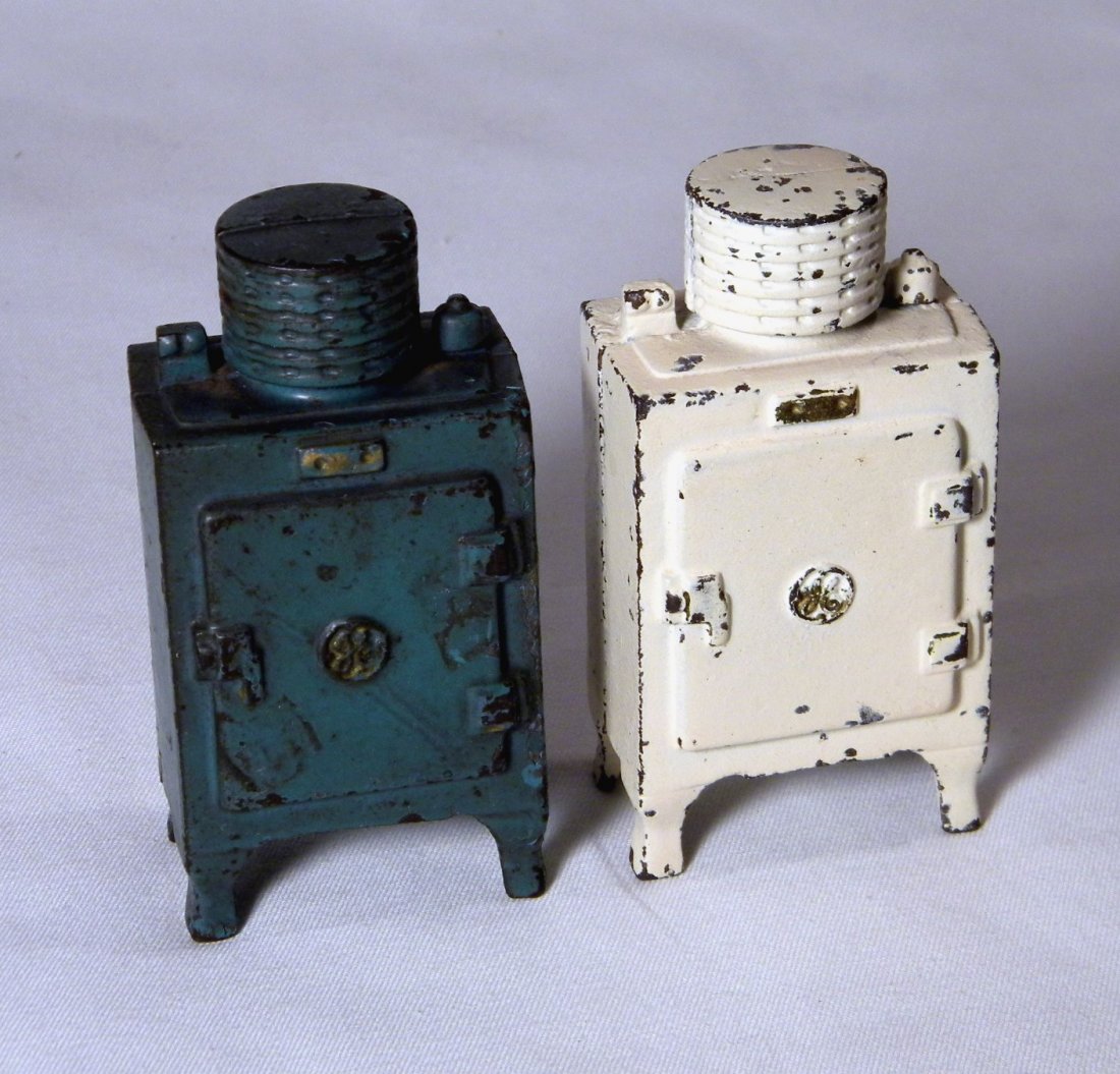 Two Small Hubley GE Refrigerator Banks: White and blue-green cast iron "GE" Refrigerator still banks by Hubley.