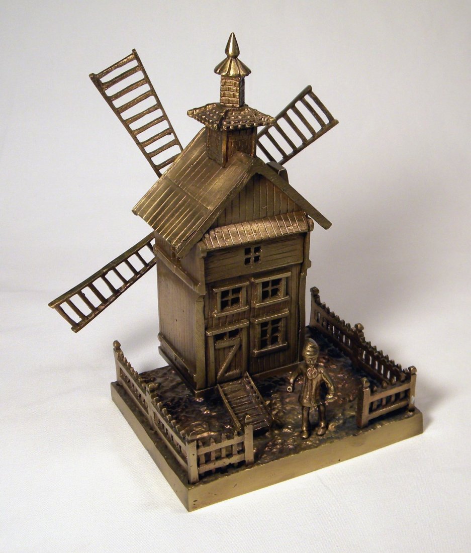 Brass Windmill Bank With Girl: Brass Windmill still bank with Girl and Fence around base, bright and excellent condition, 8 1/2" tall.