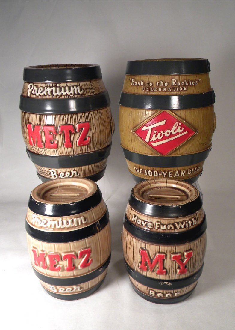 Lot of Four Beer Barrel Still Banks: Two ceramic "Premium METZ Beer" banks, Metz Brewing Co., Omaha, NE 8" and 6 1/4"; "Tivoli" The 100-Year Beer, Tivoli Brewing Co., Denver, CO, 8" h.; and "Have Fun With MY Beer" ceramic bank by MY Brew