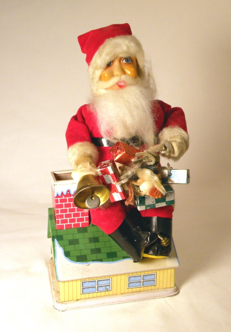 Battery-Operated Santa Bank: Battery-operated Santa bank, Copyright 1960 by Noel Decorations, Inc., round trap missing on bottom.