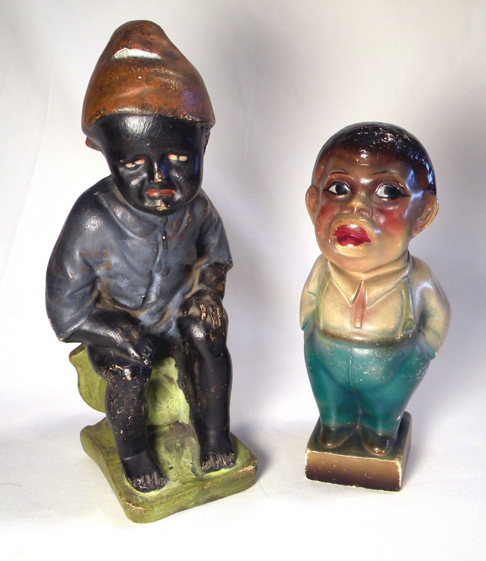 Two Black Figure Chalk Banks: Chalk Black Boy with Nightcap on Chamber Pot approx. 12"h, and Black Man with Hands In Pockets 9 1/2" tall.