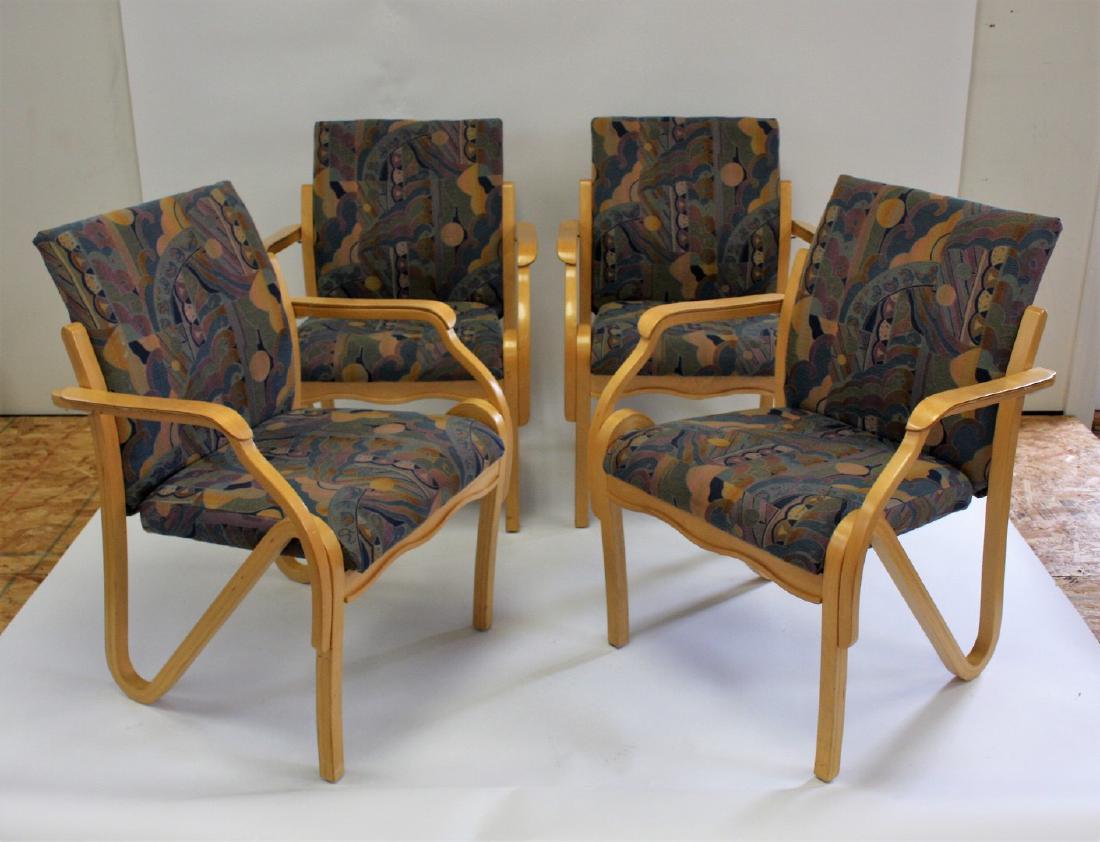 Set of Four(4) Art Deco Style Upholstered Chairs: Set of four bent wood armchairs. Theatrical Art Deco patterned upholstery; 34in.H. x 25.25in.W. x 22in.D.