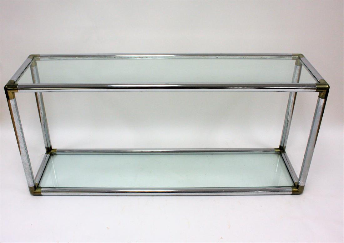 Mid Century Chrome and Glass Sofa Table: Chrome and glass sofa table. Glass top and base; 24.5in.H. x 55in.W. x 15in.D.