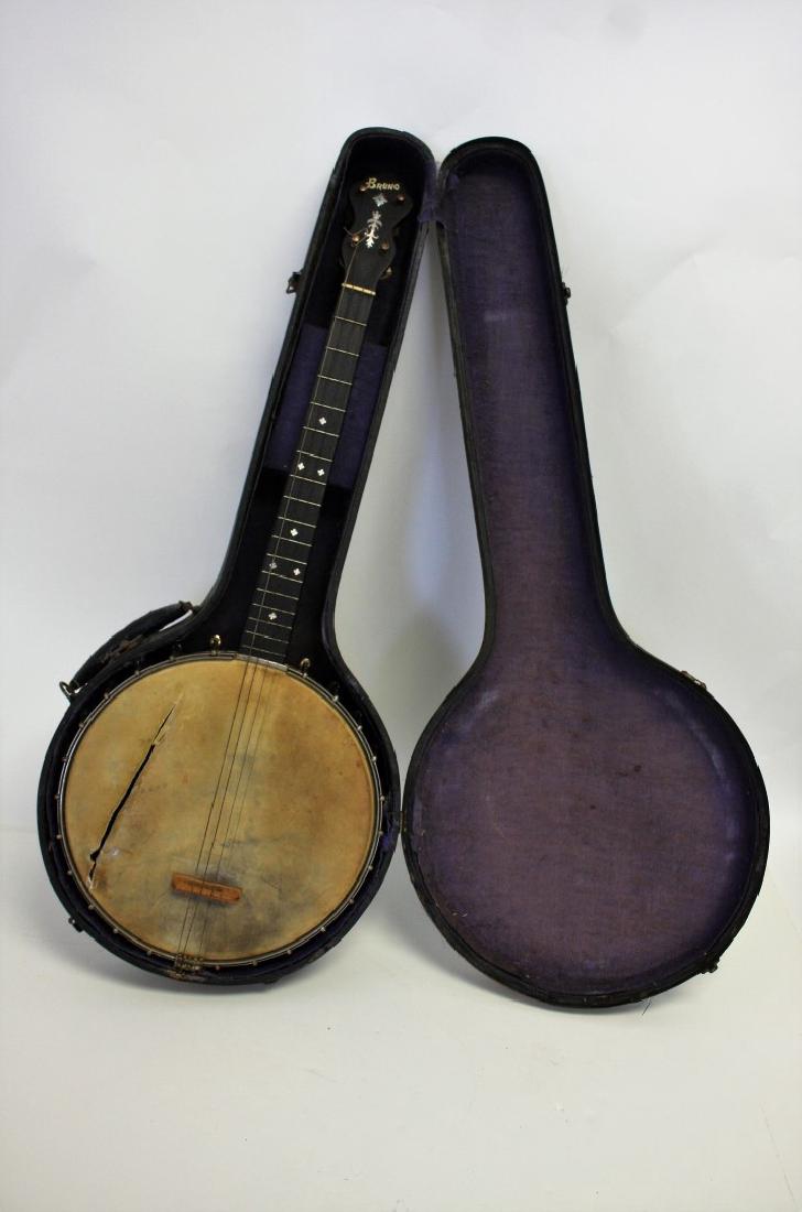 Bruno Banjo in Case: Vintage Bruno banjo in case; 30in.H. x 11in.D.