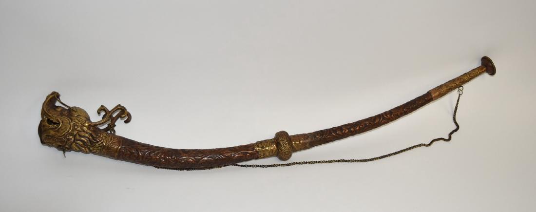 Oriental Brass Dragon Horn: Hand chaised brass horn. Dragon head design; 28.5in.L. x 3in.H.(dragon head)