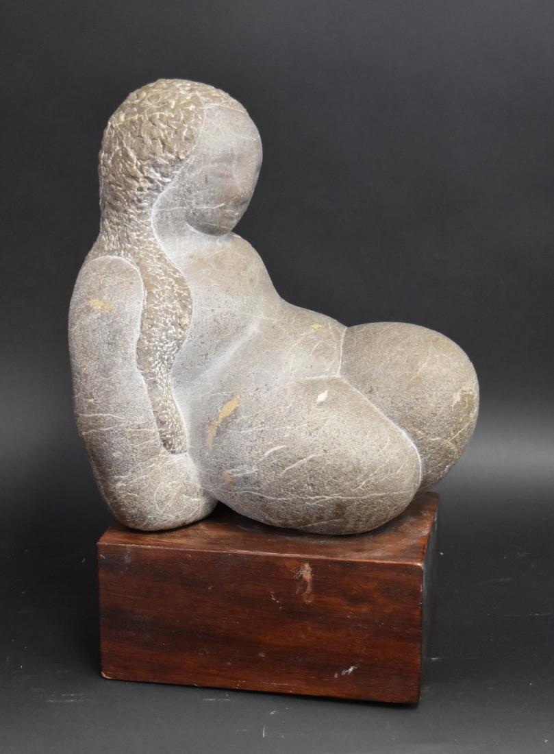 John B. Flannagan(attributed to); 20thC. Stone: Stone Carving. Reclining Nude. Signed indistintly. Wood base; 13in.H. x 12in.W. x 17in.H.(with base)