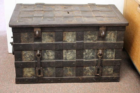 18thC. Iron Seaman's Chest: Strapped iron construction. Oersized latches and handles. Original key and locks; 18in.H. x 31.5in.W. x 19in.D.