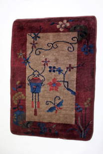 Chinese Nichols Scatter Rug: Sculpted wool scatter rug. Maroon ground; 24in. X 34in.