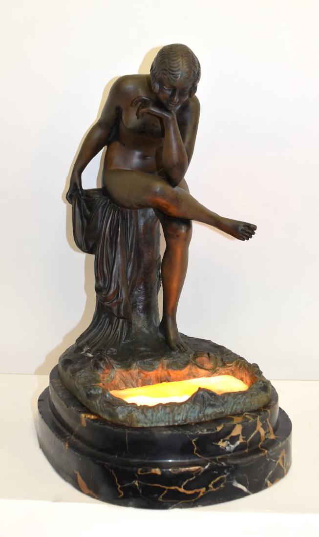 Ignacio Gallo; Art Deco Bronze Figural Lamp Signed: Spanish bronze, marble and alabaster figural lamp. Depicting a seated nude girl gazing into a pool of water. Stepped marble base with illuminated alabaster insert. Inscribed; 17in.H. x 10in.W.