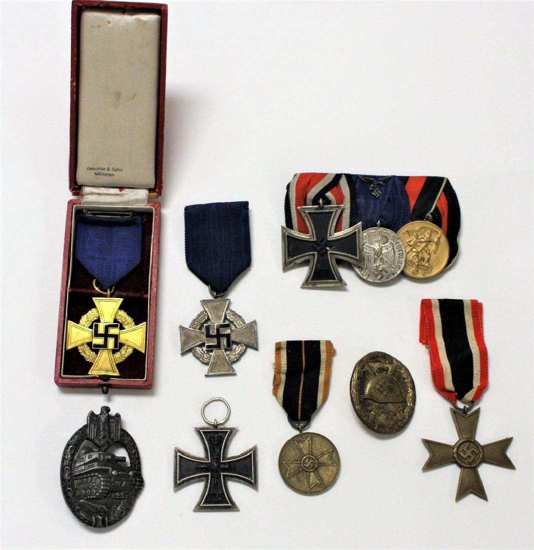 Collection of Ten(10) WWII Nazi Medals: Including: Iron Cross 2nd Class; War Merit; Service; Wound Badge; Panzer badge; etc.; 1.75in. - 4in.