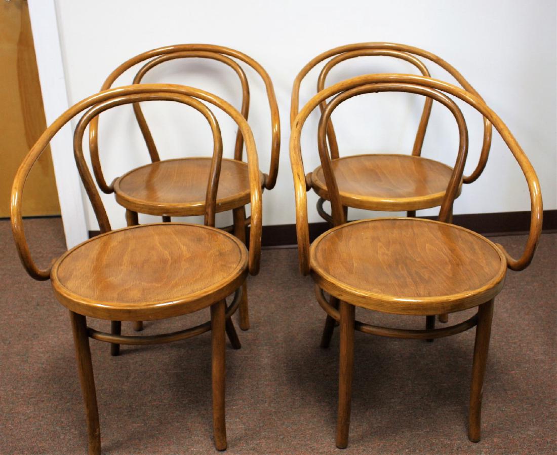 Set of Four(4) Thonet Bentwood Armchairs: Four(4) bentwood armchairs. Original labels at the underside; 32in.H. x 21.5in.W.