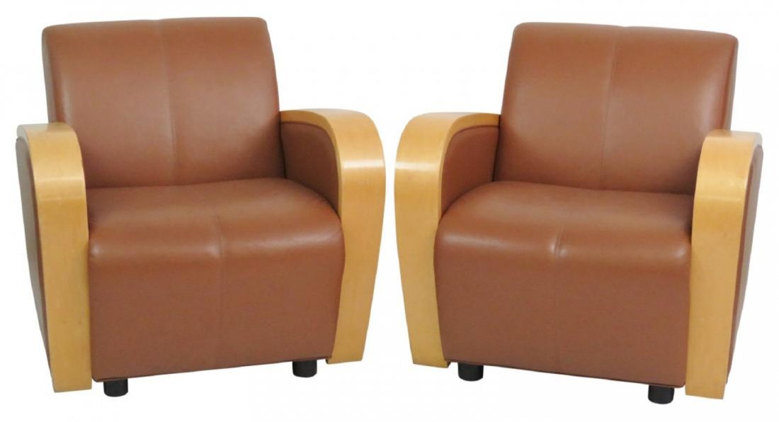 Pair of Art Deco Leather Upholstered Club Chairs: Pair of blonde laminated wood club chairs. Art Deco style. Brown leather upholstery; 29.5in.H. x 30.5in.W.