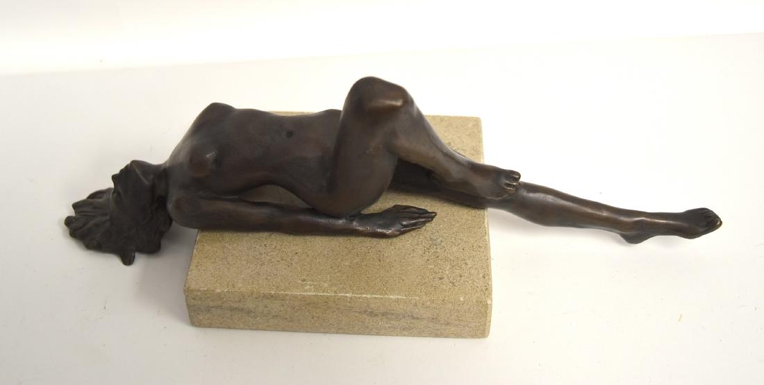 20thC. Bronze Reclining Nude Girl: Bronze figure of a reclining nude girl. Marked Artcast 4/12. Marble base; 5in.H. x 11.5in.W.