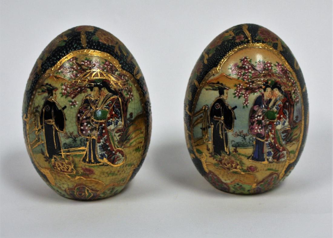 Pair of Royal Satsuma Porcelain Eggs: Pair of hand painted porcelain eggs; 4.5in.H. x 3.5in.W.