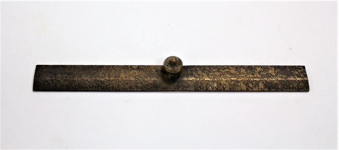 Tiffany Stiudios Bronze Desk Ruler Signed: Bronze desk ruler. Impressed Tiffany Studios New York; 1.25in. X 12in.