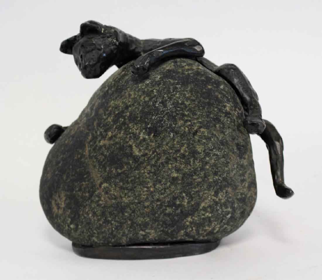20thC. Bronze and Stone Sculpture: Bronze cat on a rock. Artist signed Auvil and inscribed OK, copyrighted and dated '97; 8.25in.H. x 9in.W. #182006