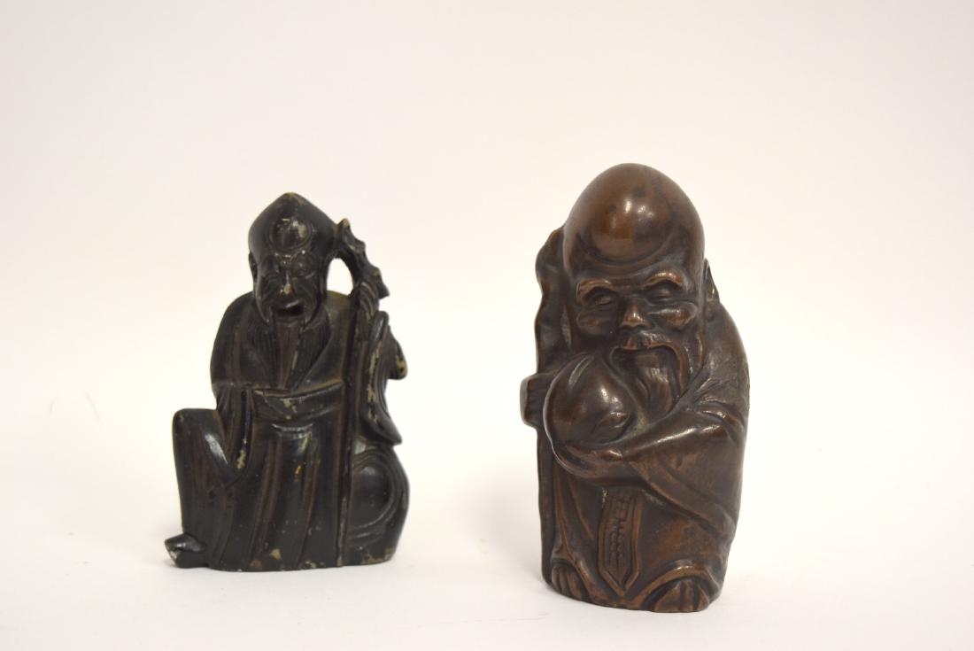 Two(2) Chinese Figures: One(1) metal, one(1) soapstone; 4in. - 4.5in.