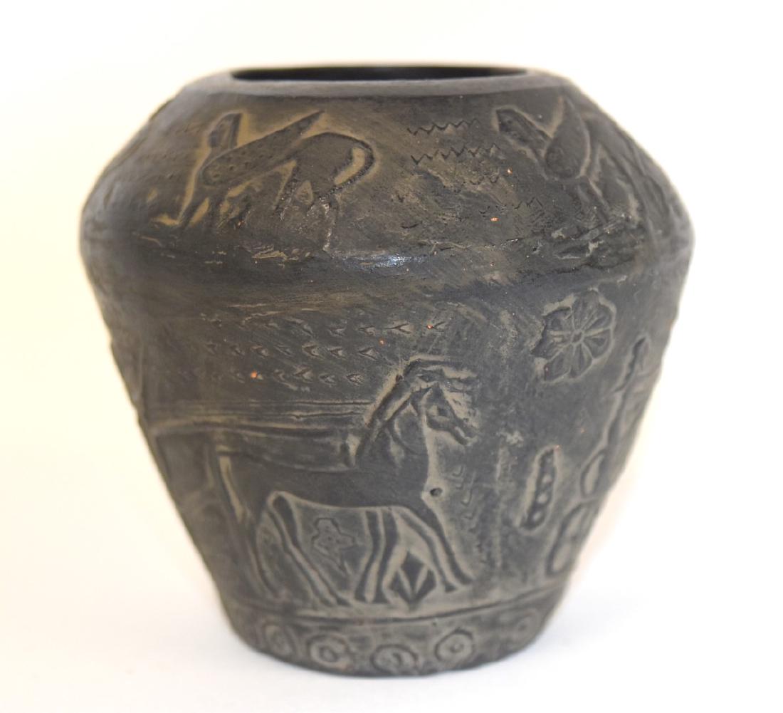 Eygptian Style Pottery Vase: Miniature pottery vase. Decorated with chariots and sphinx; 3in.H. x 3.25in.W. #185025