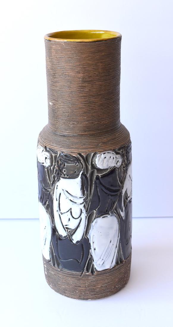 20thC.Italian Modernist Pottery Vase: Mid-century modern pottery vase. Incised figural decoration and multi-glaze finish. Marked Raymor - Italy and having original studio label; 12.5in.H. x 4.5in.W.