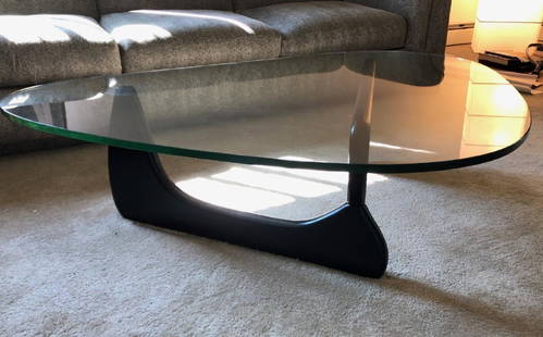 Noguchi Style Ebonized Wood and Glass Coffee Table: Ebonized wood and glass coffee table. Original design by Noguchi for Herman Miller; 16in.H. x 50in.W. x 36in.D. x .75in.(glass thickness)