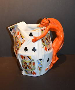 Royal Bayreuth Limited Edition Porcelain Pitcher: Limited edition porcelain pitcher. Red devil and playing cards. Marked at the underside. Limited edition 484/1000. Reproduction of old Royal Bayreuth Masterpieces. Originally 1905; 7.5in.H. x 8in.W.