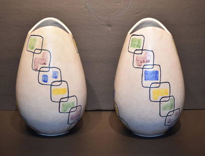Pair of German Mid-Century Modern Porcelain Vases: Pair of ovoid porcelain vases. Multi-colored abstract form decoration. Incised marking and stamped Made in Germany at the underside; 9in.H. x 5in.W.
