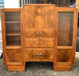 Art Deco Mahogany Secretary Cabinet: Mahogany stepped secretary cabinet. Fitted interior with drop-down desk door. Three(3) drawers; 46in.H. x 48.5in.W. x 14in.D.