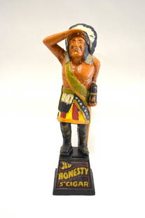 Cast Iron Cigar Store Indian Still Bank: Hand painted cast iron still bank. Cigar Store Indian - Old Honesty 5cent Cigar; 13in.H. x 4.5in.W.