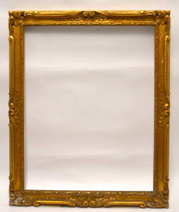 Ornate Carved and Gilt Wood Frame: Heavily carved and gilt ornate frame; 28in. X 22in.(opening), 32.5in. X 26.75in.(overall)