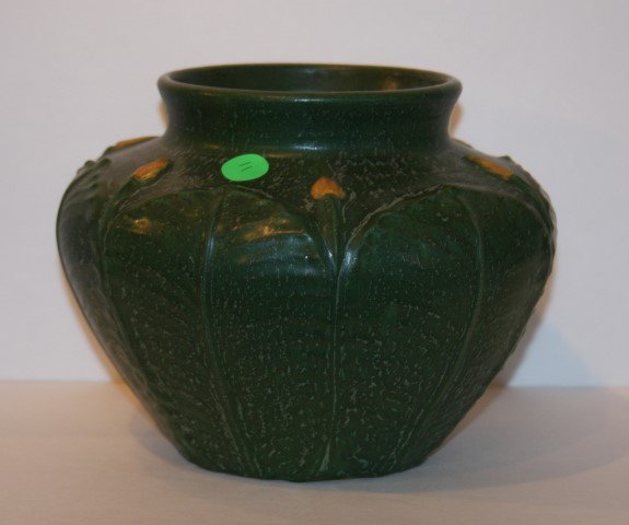 Ephraim Faience Pottery Vase Signed: Arts and Crafts glazed pottery vase. Floral bud and leaf design. Mark at bottom; 7in. H. x 8in. D.