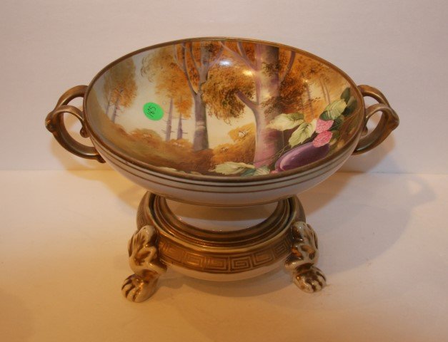 Nippon Porcelain Bowl with Stand: Hand painted porcelain pedestal bowl on stand. Decorated with plums in a landscape; 7in. H. x 11.5in. W.